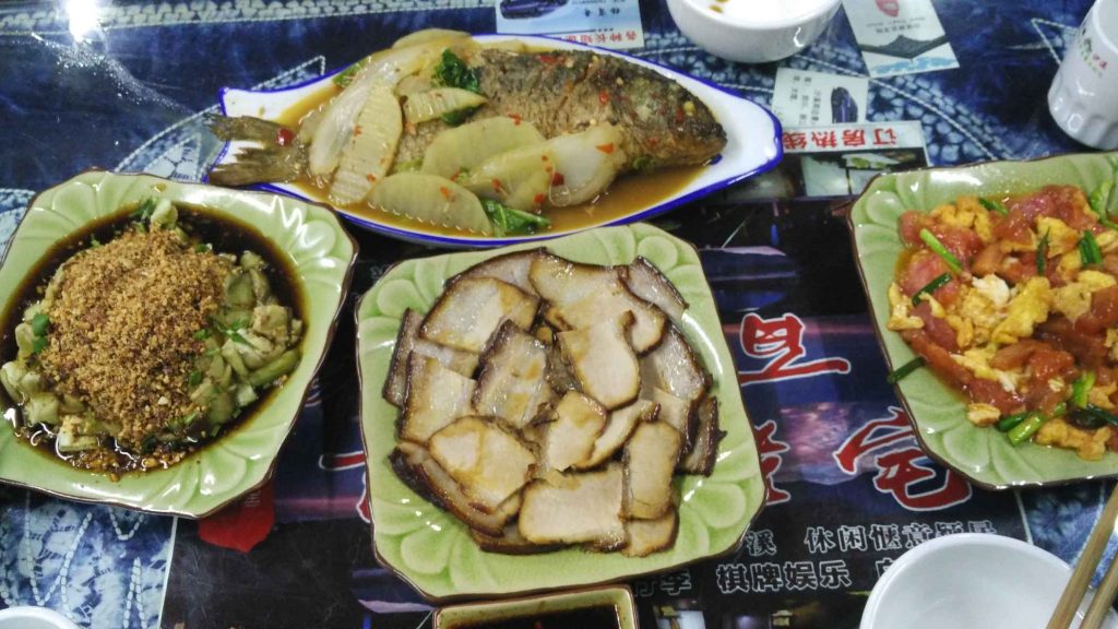 Local braised fish, twice-cooked pork, roasted eggplant with ground peanuts, and scrambled egg with tomato. Not exactly the ‘white-people Chinese food’ I’d find back home – this is a million times better!