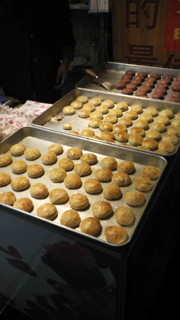 Flaky pastry bun-things with red bean and rose inside (yes, an actual rose). Tasted fantastic, way better than it sounds