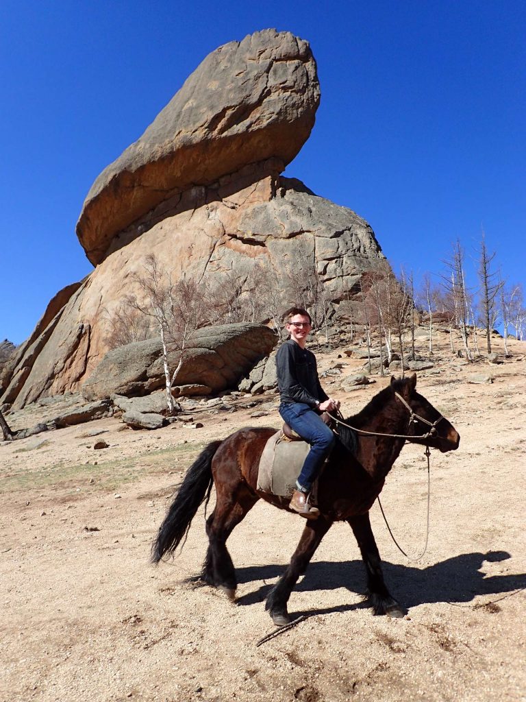 Three seconds before this picture, the horse was standing nicely in front of the rock; ten seconds after, it had galloped twenty metres away – it was used to a much more firm hand on the reins (Bagi let me use his own horse for the picture)