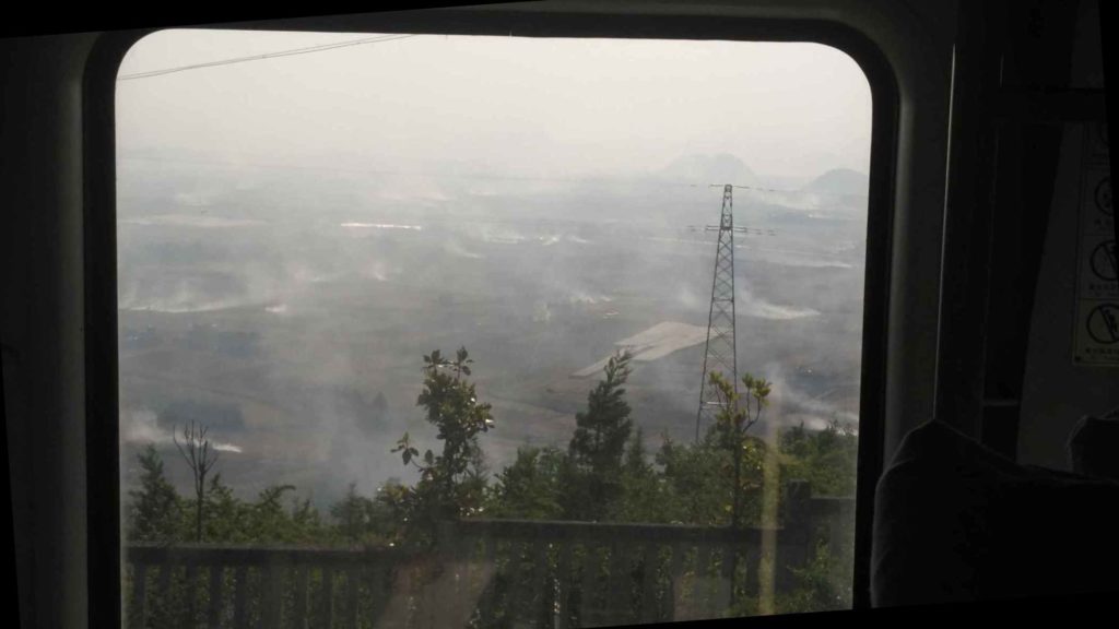 Burning crops to fertilize the fields. I woke up to this outside the train window - I thought I’d missed Kunming and ended up in the 6th circle of hell