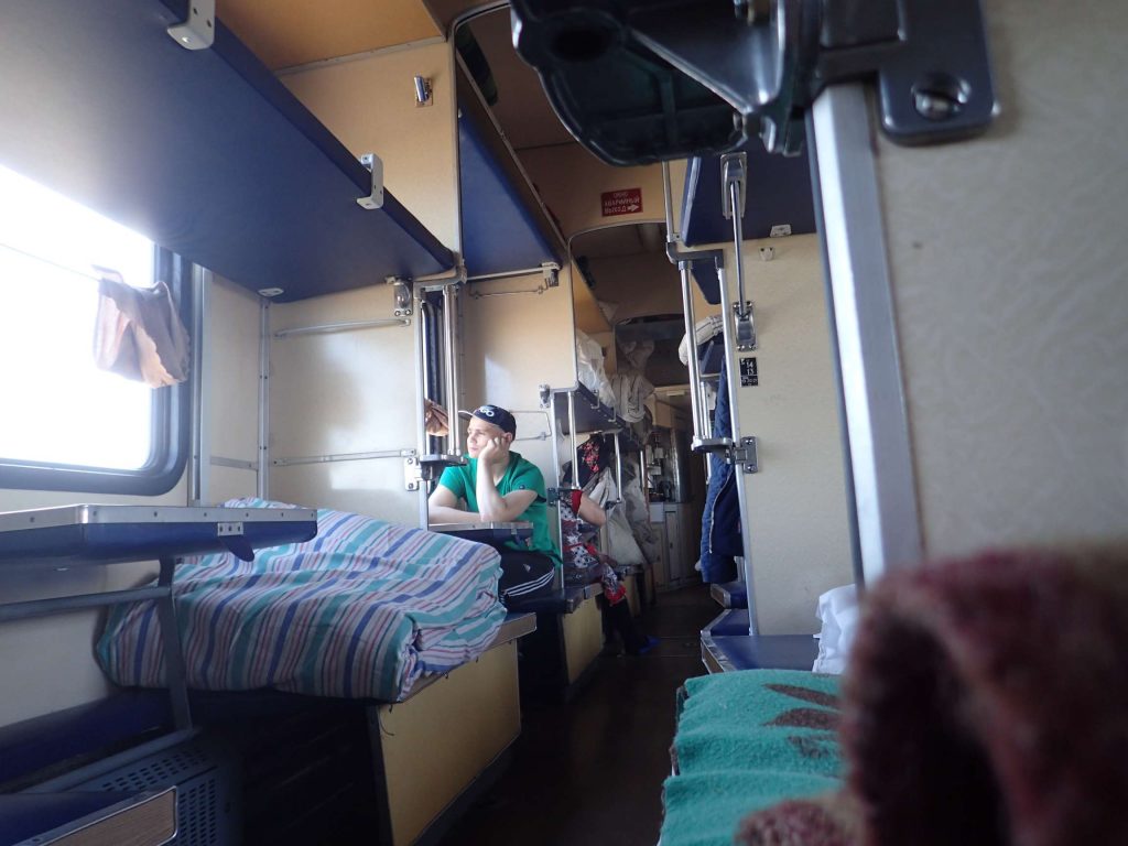 Welcome to platzkartny. See here the two beds on the opposite window (plus Igor looking contemplative)