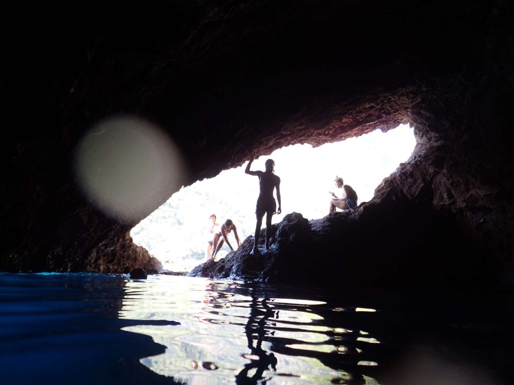 Some friends I later made, silhouetted against the cave opening. This time we swam to the cave from the beach.