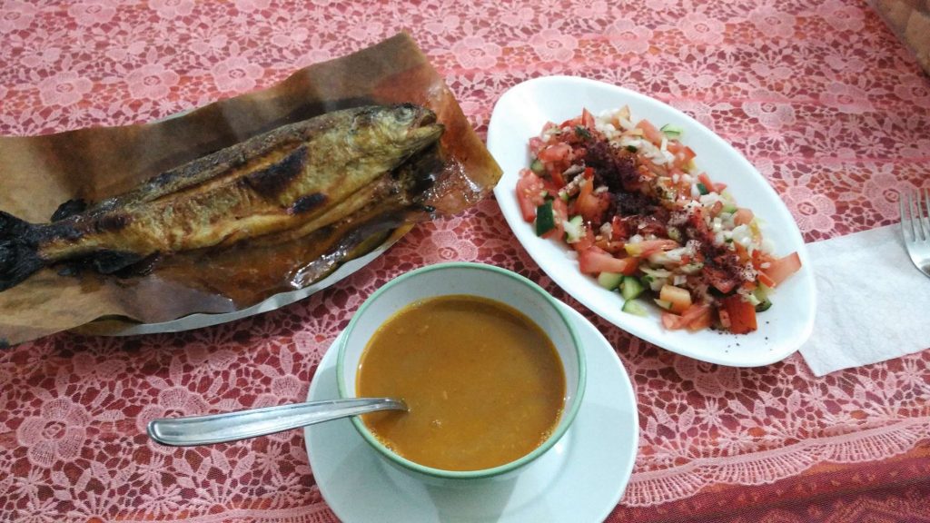 The night’s dinner of fried fish, soup, and vegetables – classic Turkish food