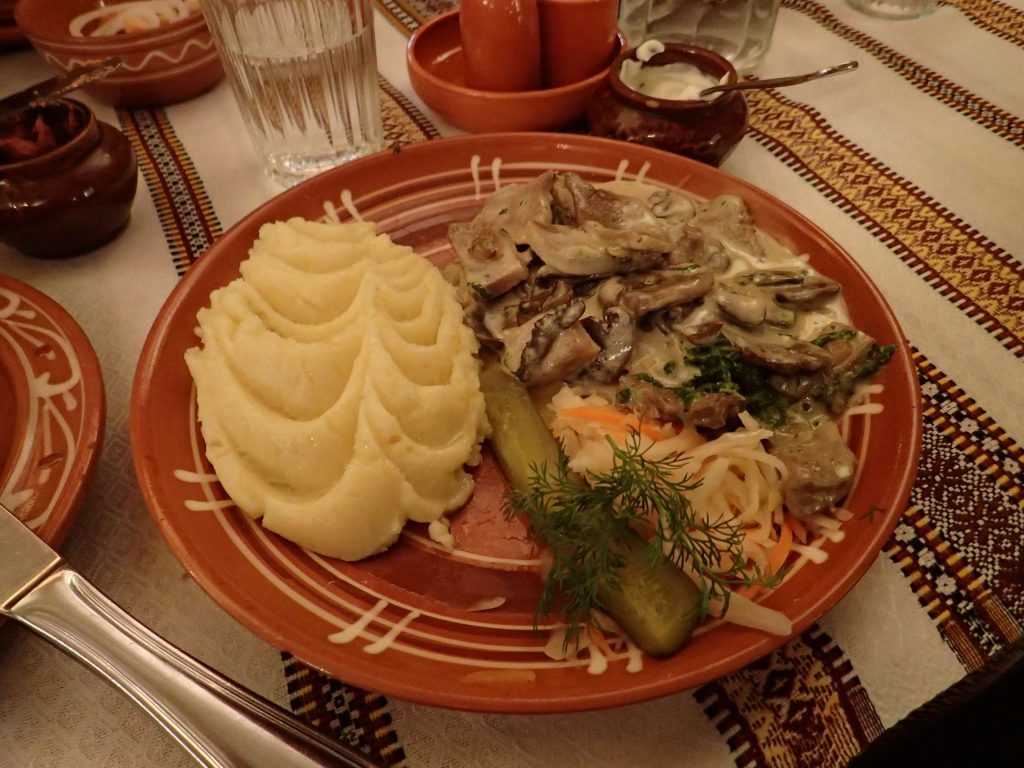 Ox tongue with mushroom sauce and mashed potato. So much better than it sounds, in Russia it's a real delicacy. The tongue was like slow-cooked beef, wonderfully tender