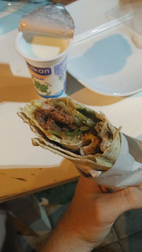 Adana kebab, with ayran (watered-down yoghurt + salt, very refreshing) in the background