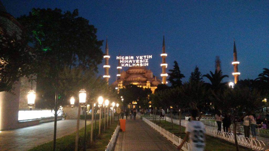 Lights suspended between the Blue Mosque’s minarets