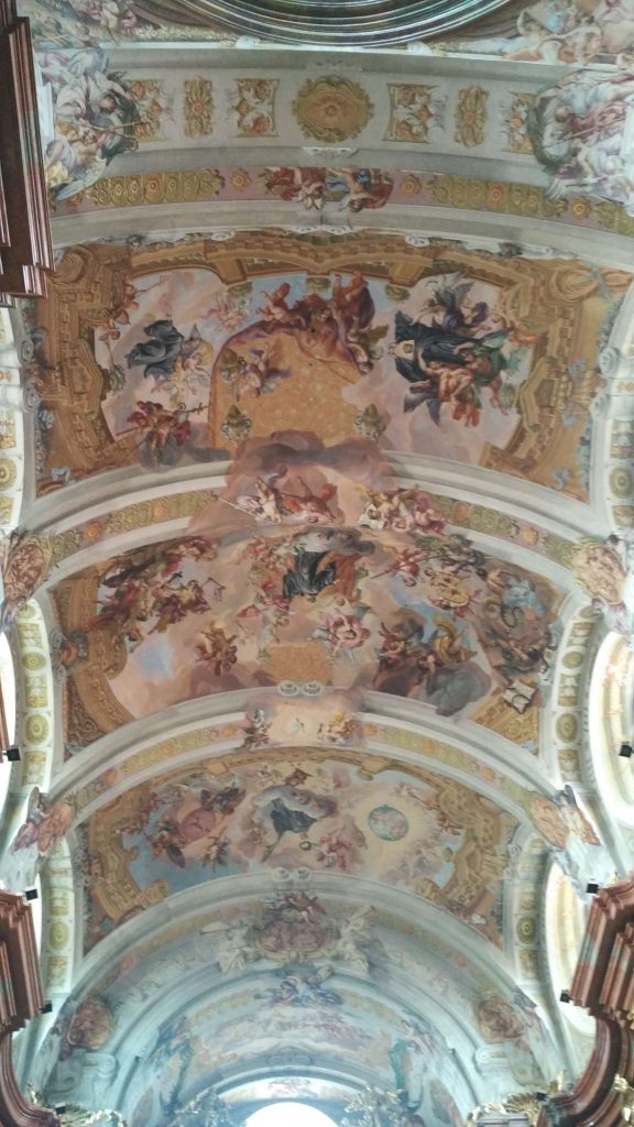 And the roof. Notice the clever optical illusion painted in: the edge of the roof extends into the painting to create the illusion of the roof opening up to the heavens